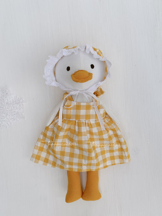 Duck doll with yellow checkered dress