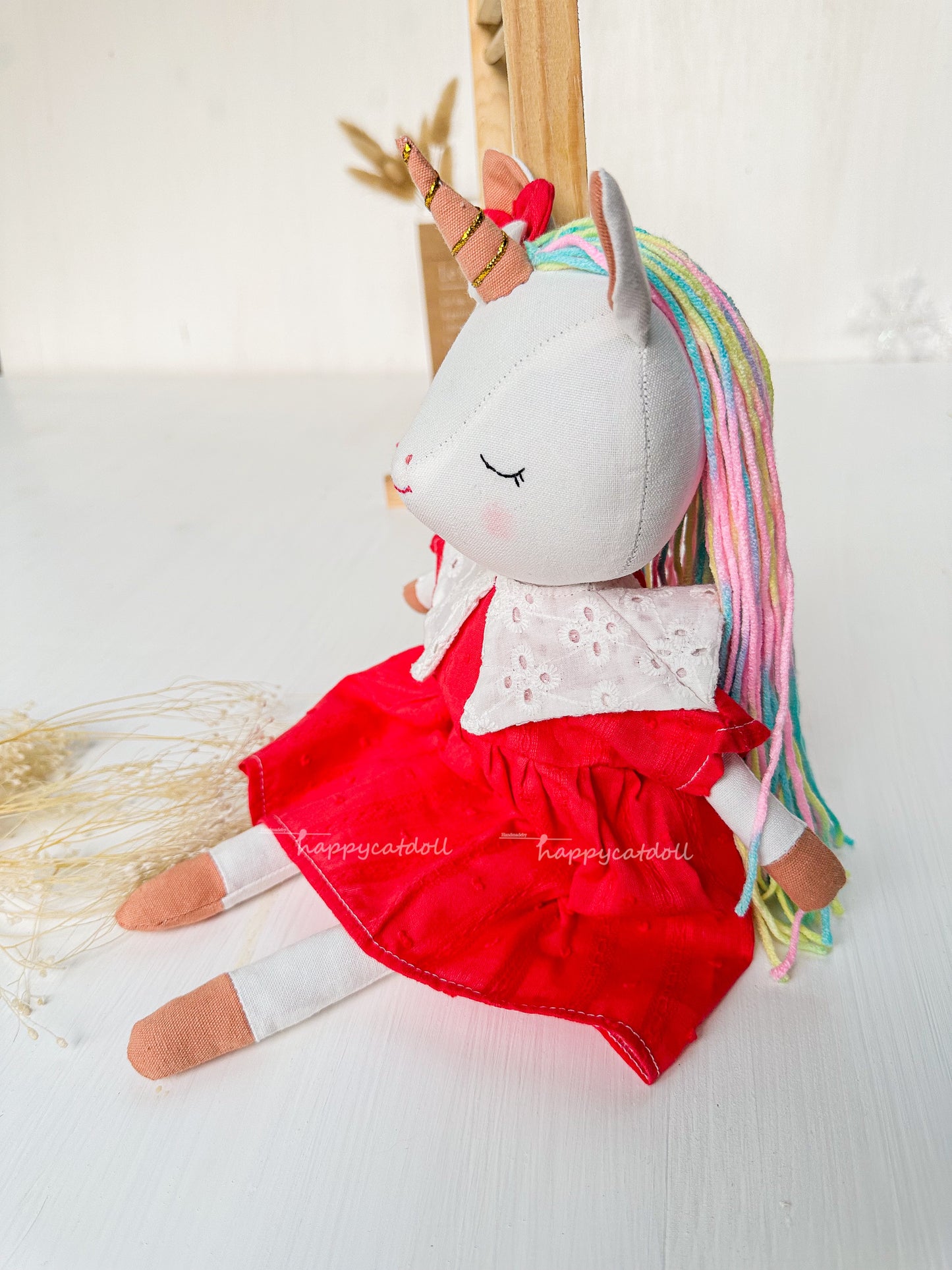 Unicorn with red dress