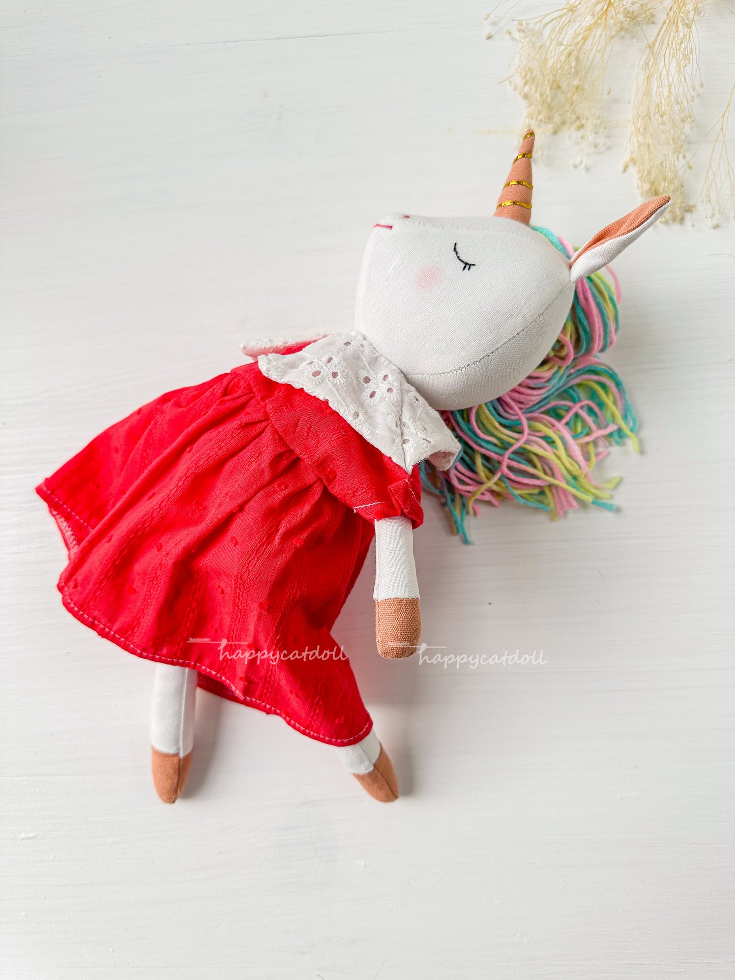 Unicorn with red dress