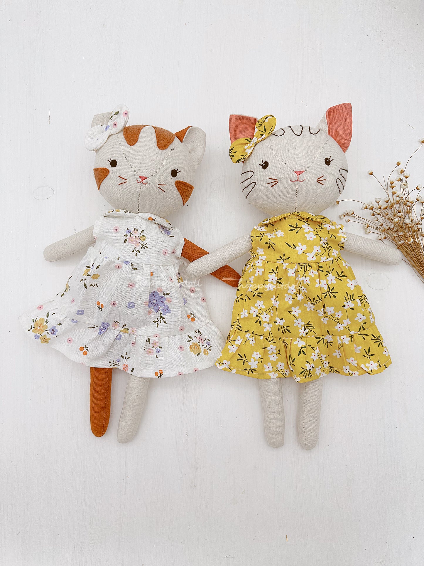 Two cute cat dolls with floral dresses