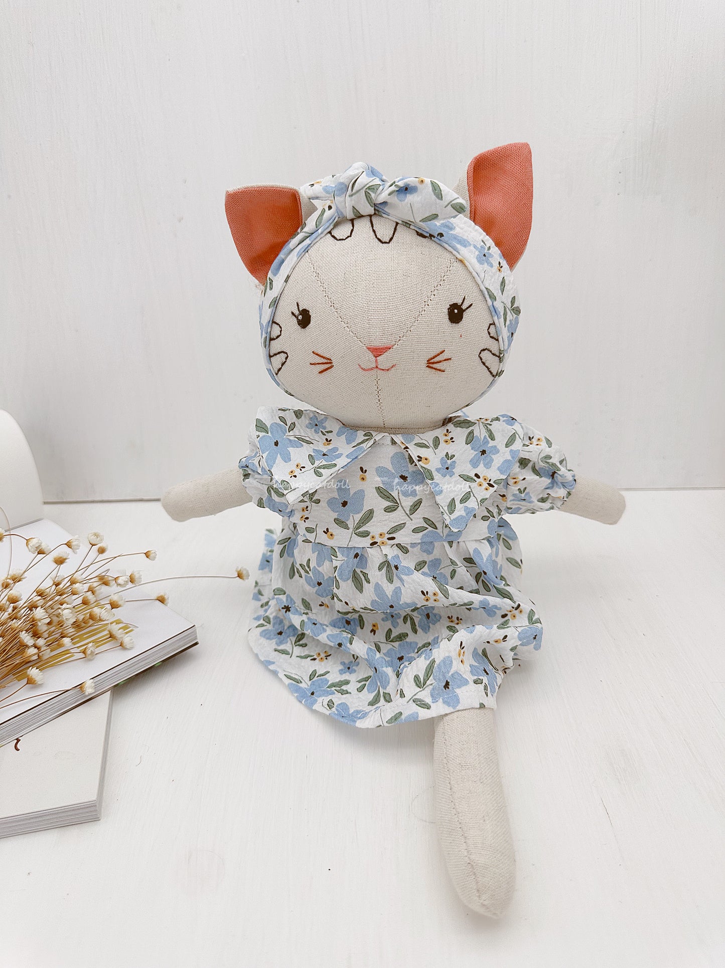 Cat doll with blue floral dress