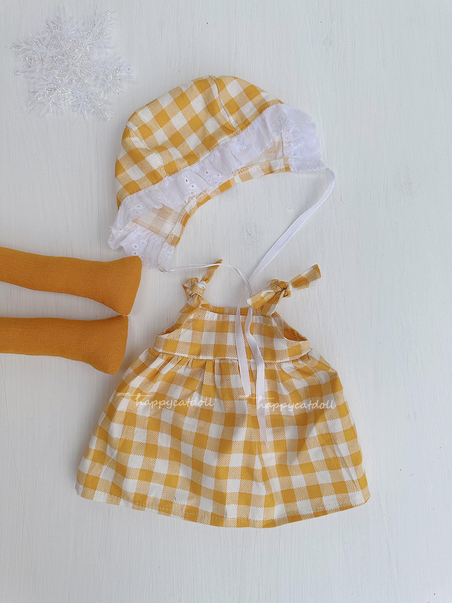 Duck doll with yellow checkered dress