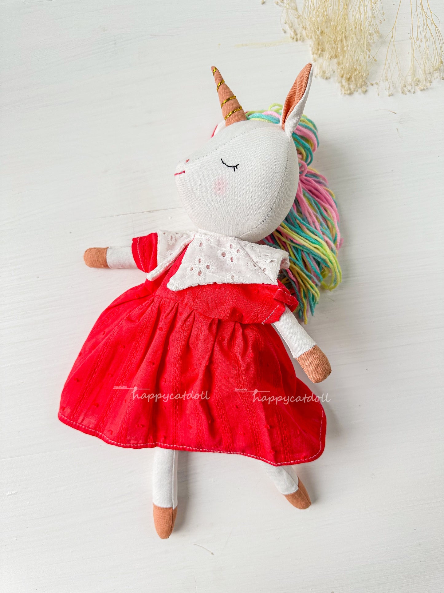 Unicorn with red dress