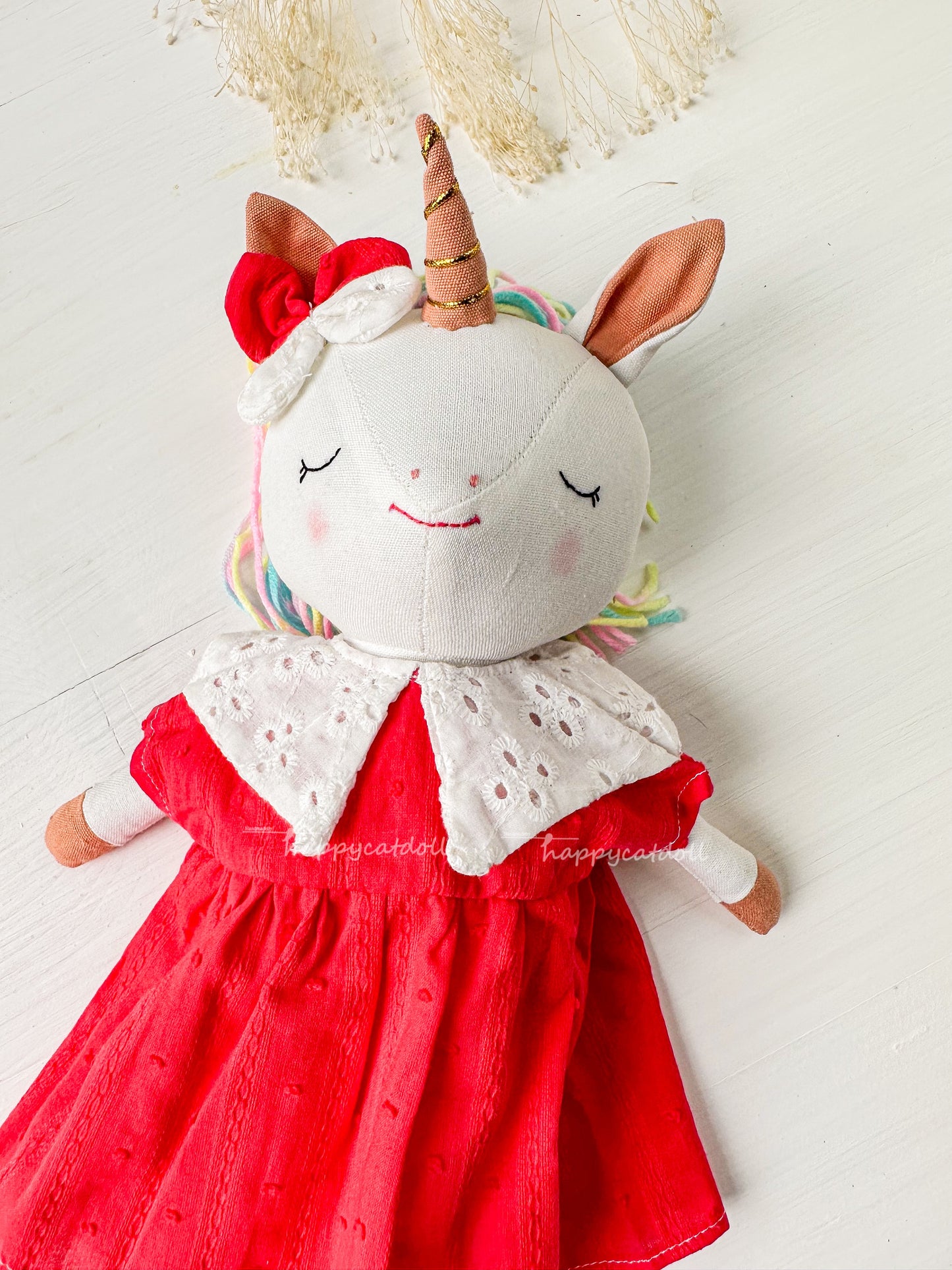 Unicorn with red dress