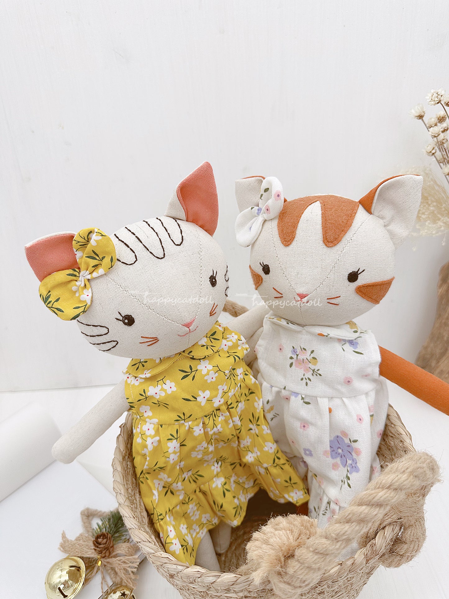 Two cute cat dolls with floral dresses