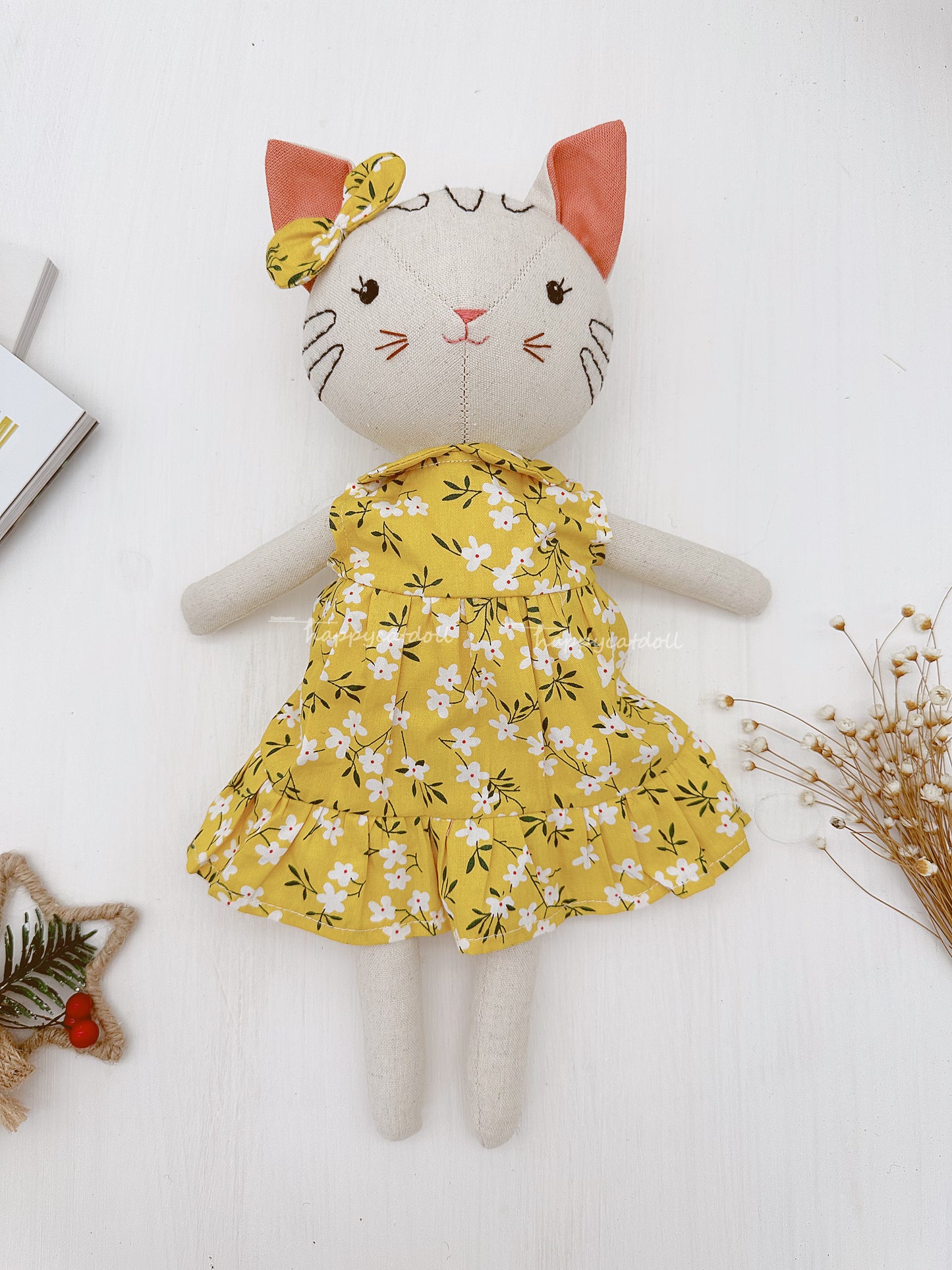 Two cute cat dolls with floral dresses