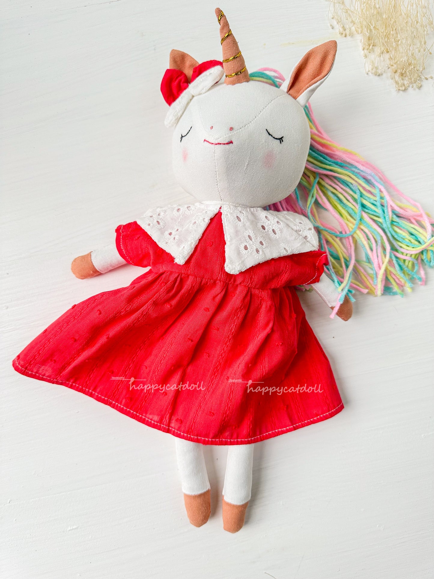 Unicorn with red dress