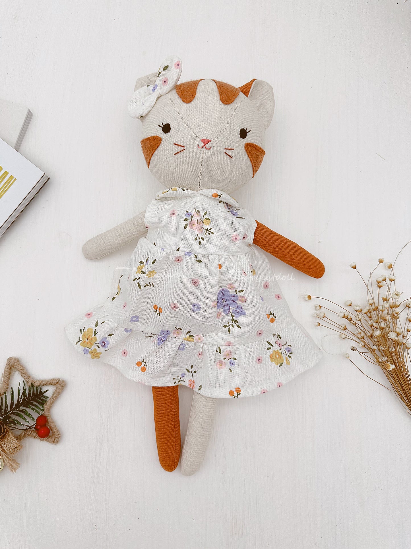 Two cute cat dolls with floral dresses